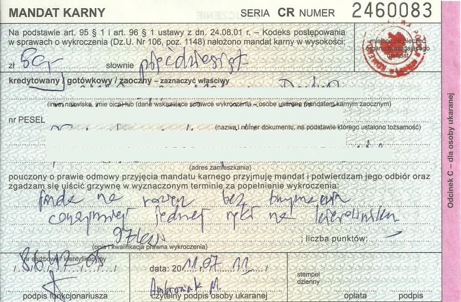 Za "Jazdę na rowerze bez trzymania conajmniej jednej ręki na kierowniku"