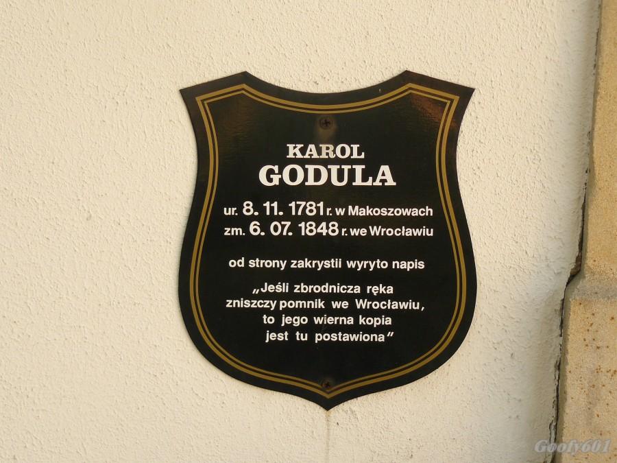 tablica - na murach prezbiterium kościoła w Bujakowie.