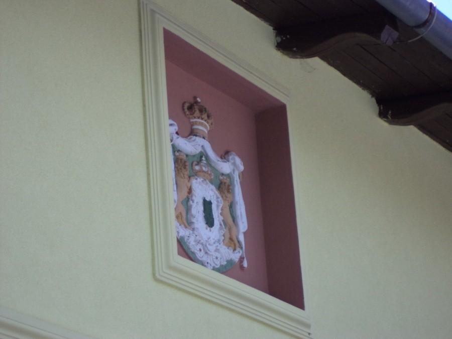 Herb na leśniczówce