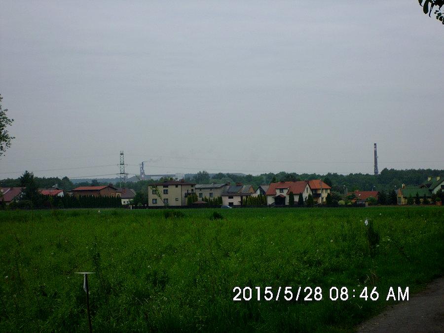 W środku kadru hałda w Kostuchnie