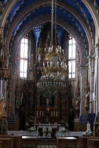 Zdjęcie zza krat ołtarza głównego w kościele pw. św. Floriana w Sulejowie