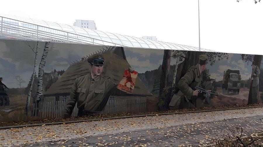 Mural - ulotka: Olbrzym i zapluty karzeł reakcji