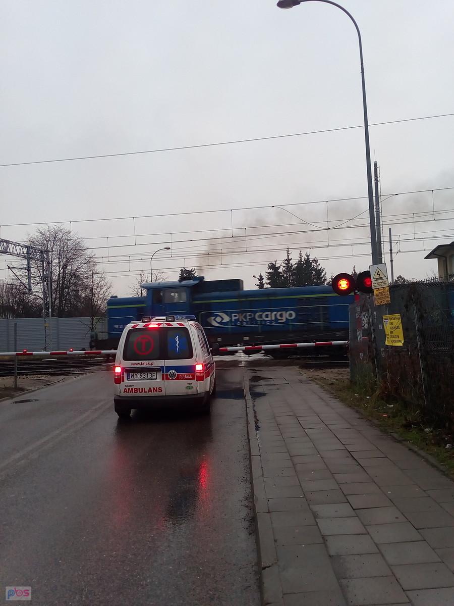 Na przejeździe kolejowym