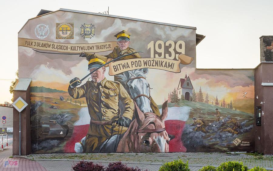 Mural upamiętniający Bitwę pod Woźnikami przy skrzyżowaniu ulic Dworskiej i Koziegłowskiej