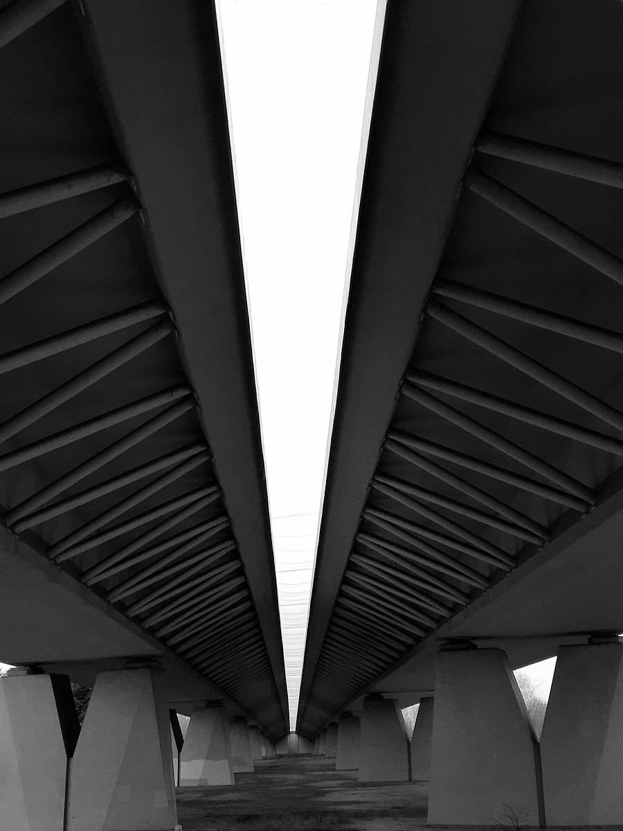 Under the bridge.